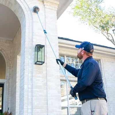 tech sweeping exterior of home